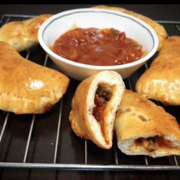 Irresistible Pepperoni Pizza Pockets served with dipping sauce