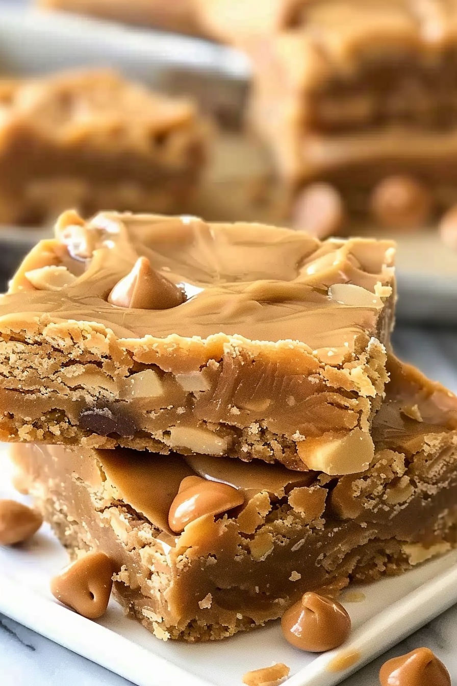 Golden peanut butter cookie bars studded with chocolate chips.